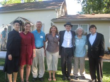 Students who role played Holocaust rescuers pose with facilitators from the seminar at Deer Spring Winery