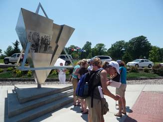 Teachers examine the Nebraska Holocaust Memorial at Wyuka Cemetery