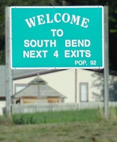 Road sign saying Welcome to South Bend, Next 4 Exits